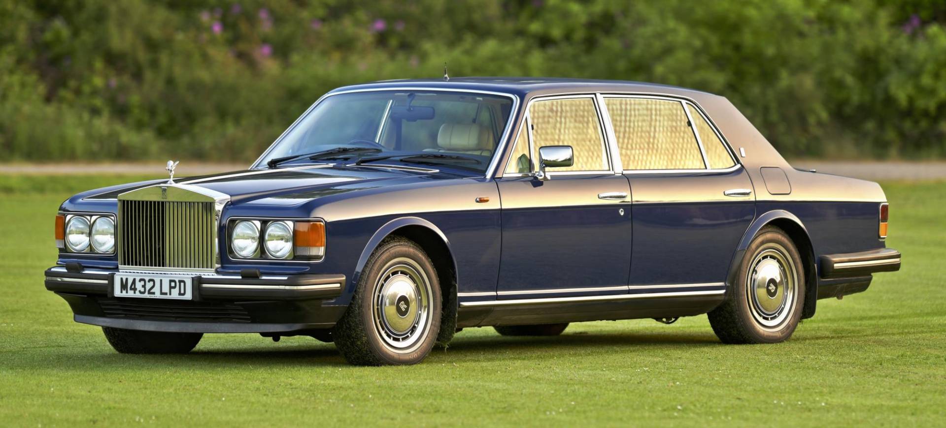 A 1986 Rolls Royce Silver Spirit D493 BMV twin carb five door saloon  6750cc in vermilion red circa 93389 recorded miles V5 manual and part  service history originally retailed by Jack Barclay