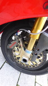 Front fork, brake calipers and magnesium mounting system