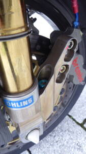 Front fork, brake calipers and magnesium mounting system