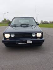Image 1/4 de Volkswagen Golf Mk I Convertible 1.8 (1989)