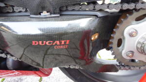 Swing arm with carbon cover