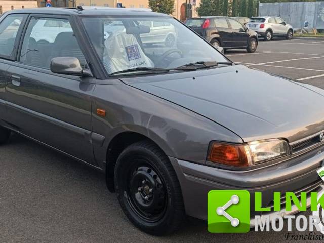 Image 1/8 of Mazda 323 Turbo 4WD (1991)