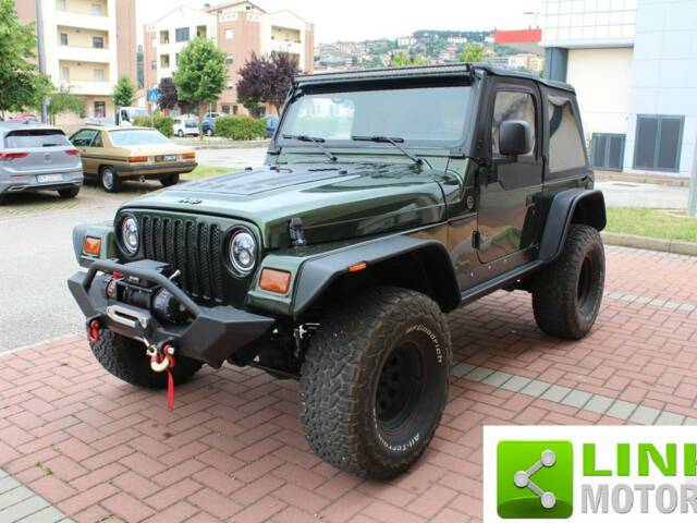 Image 1/10 de Jeep Wrangler Sport 2.5 (1998)