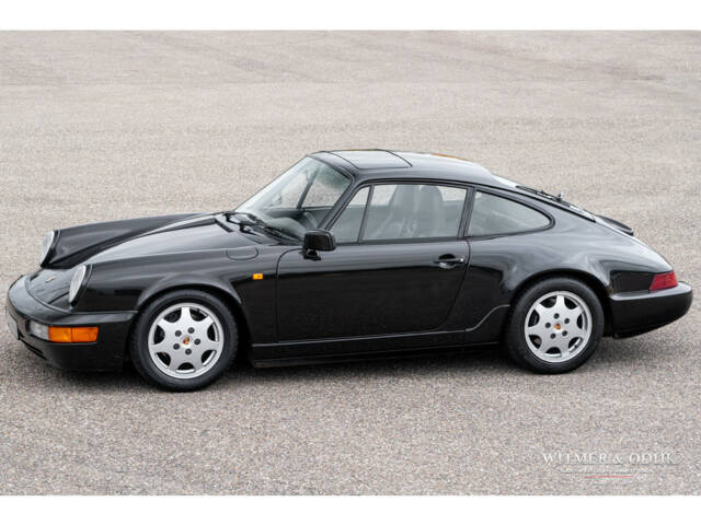 Image 1/28 de Porsche 911 Carrera 4 (1990)