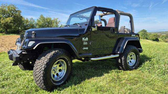 Bild 1/22 von Jeep Wrangler Sahara 4.0L (2004)