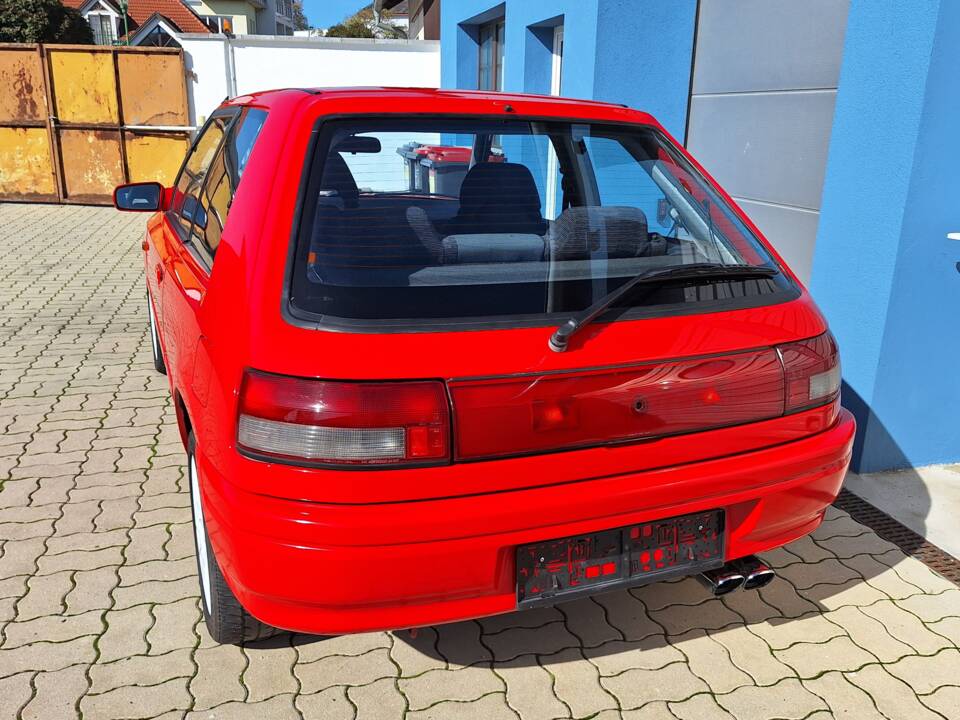 Image 2/8 de Mazda 323 Turbo 4WD (1990)