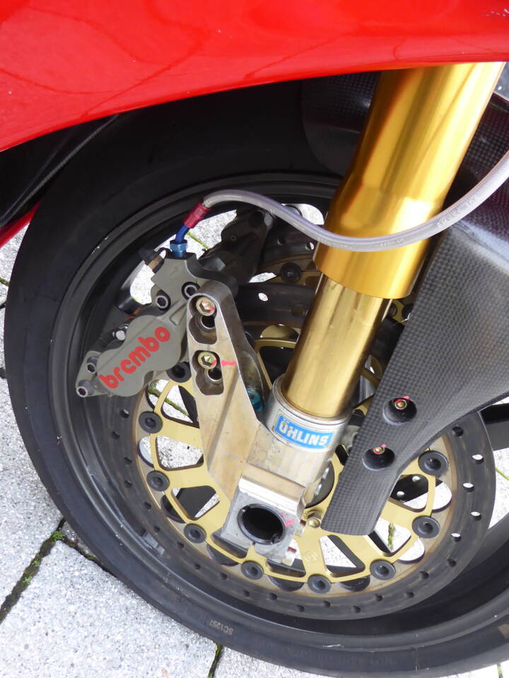 Front fork, brake calipers and magnesium mounting system