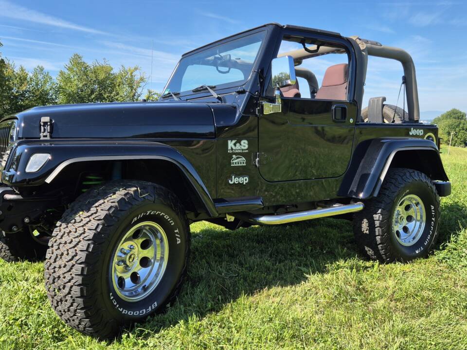 Bild 1/22 von Jeep Wrangler Sahara 4.0L (2004)