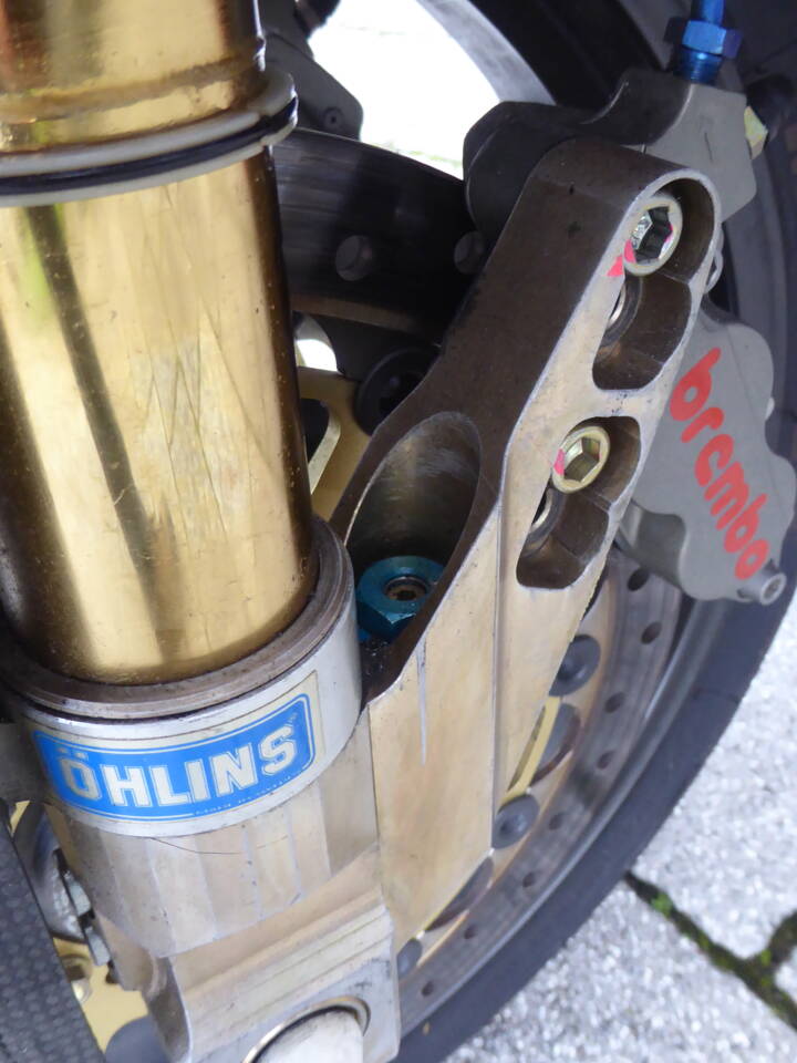 Front fork, brake calipers and magnesium mounting system