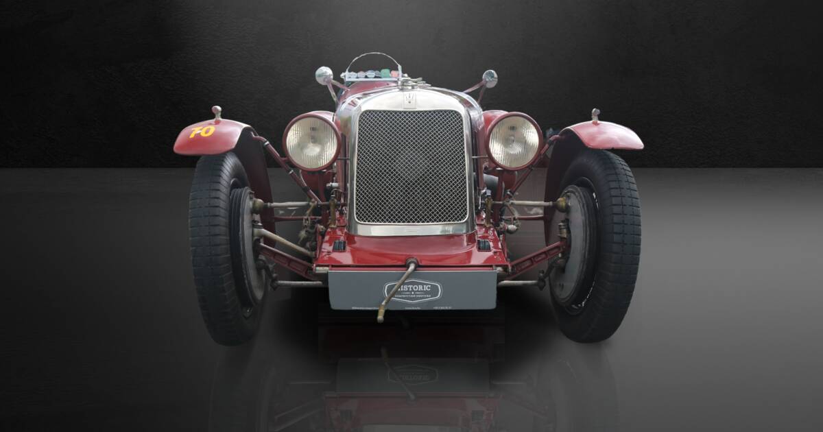 Enchères Lot 975 - M.L, voiture de course n° 63, mécanique, en tôle
